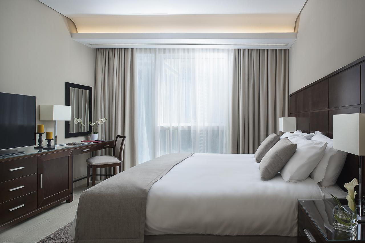 Dusit Doha Hotel Buitenkant foto A bedroom