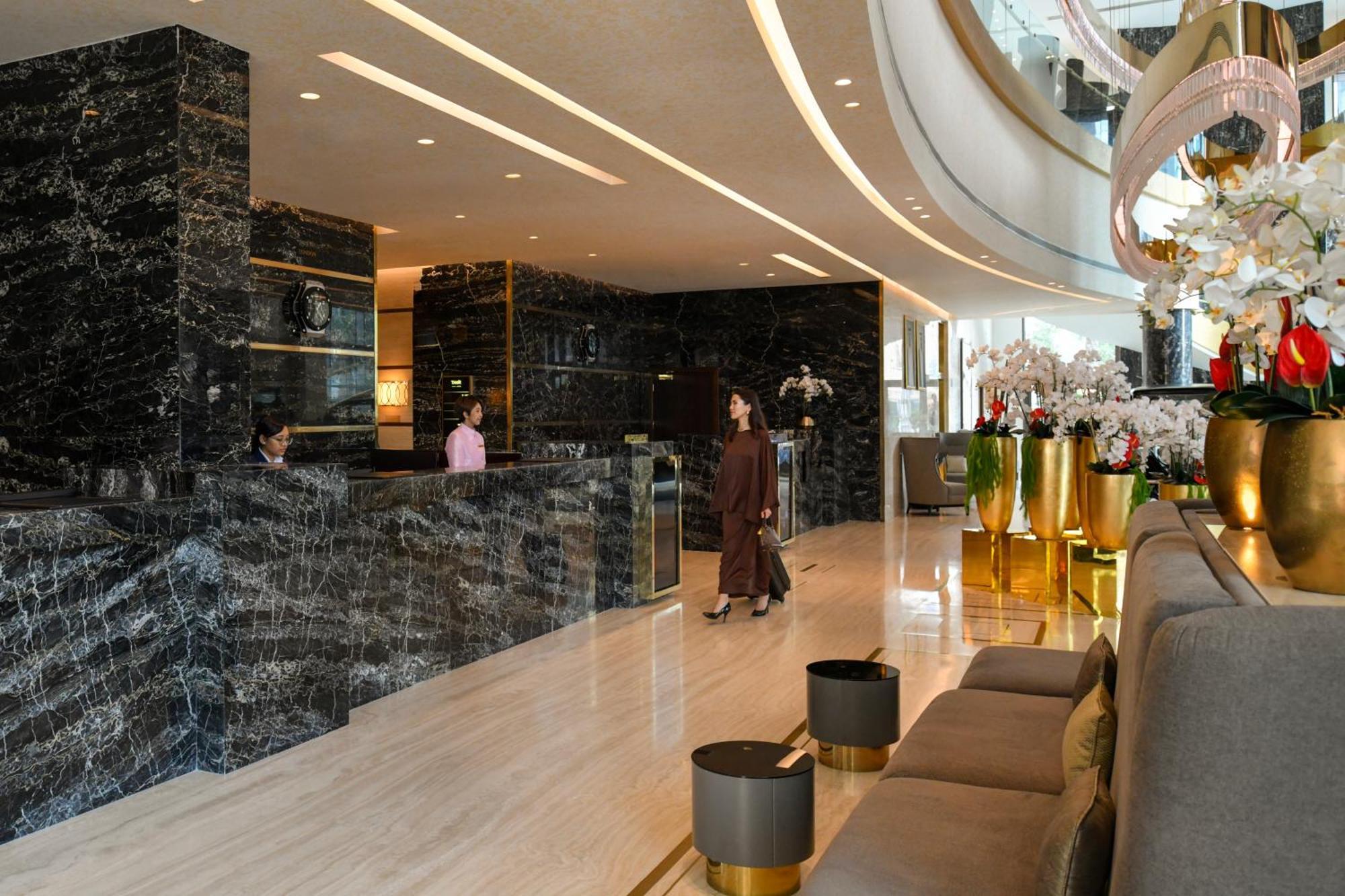 Dusit Doha Hotel Buitenkant foto The lobby of the hotel