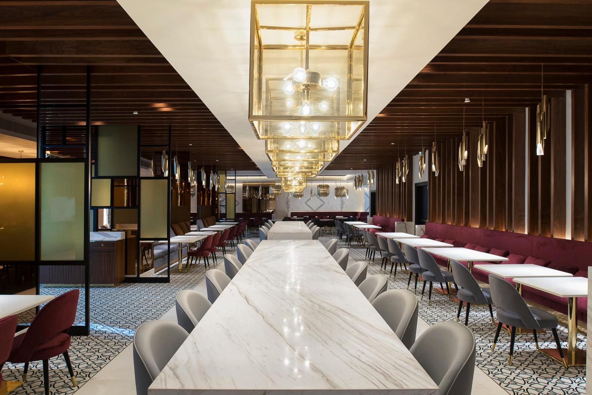 Dusit Doha Hotel Buitenkant foto The interior of the lounge
